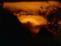 Dusk behind rocky landscape, sun gradually going down, Botswana, Africa Stock Footage