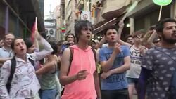 CLEAN : Istanbul police use tear gas to break up Gay Pride parade News Clip