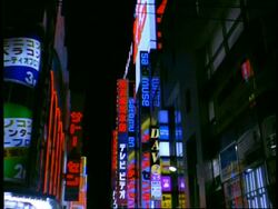 MS low angle view of neon signs at night, Akihabara electric district, Tokyo, Japan Stock Footage