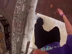 POV of young men doing a parkour freerunning jumping and flipping stunt. - Model Released - HD Stock Footage