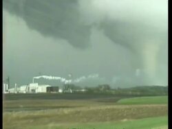 MWA zooming out to WA, POV from car, tracking right, Tornado moving across landscape, USA Stock Footage