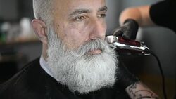 brutal barber clipper mows bearded adult senior hipster Stock Footage