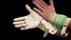 SLO MO Gymnast clapping his wrapped hands together Stock Footage