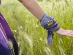 Woman with hand in summer breeze Stock Footage