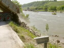 MS dumper loading off material at deconstruction of bridge over river Mosel / Wellen, Rhineland Palatinate, Germany Stock Footage