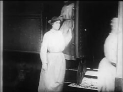 B/W 1917 suffragists under arrest on train exit train in single file / Washington, D.C. / newsreel Stock Footage