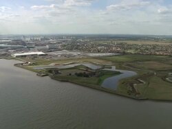 Aerial over the River Thames towards Tilbury Fort / Essex, England Stock Footage