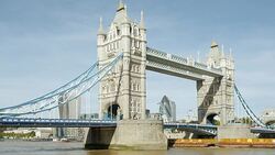 Cargo Ship Passing Under Tower Bridge In London Stock Footage
