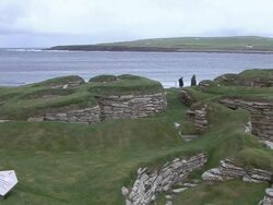 PAN Ruins of the Neolithic settlement Skara Brea / Orkney, Scotland, United Kingdom Stock Footage