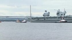 HMS Queen Elizabeth, the Royal Navy's new aircraft carrier, leaves dock to begin sea trials News Clip