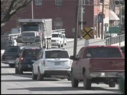 Surviving miner develops slight fever, but responds to stimuli, funeral of another miner News Clip