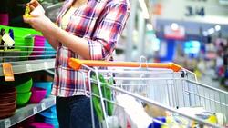 Woman buying cosmetic products in supermarket. Stock Footage