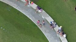 Families paddling in Princess Diana fountain News Clip