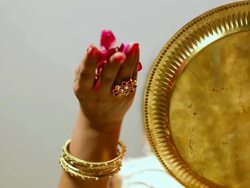 Low angle view of young woman falling flower petals Stock Footage