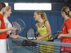 MS Women Talking After Playing Tennis Double Stock Footage