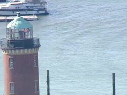 AERIAL MS View of lighthouse / Cuxhaven, Schleswig-Holstein, Germany Stock Footage
