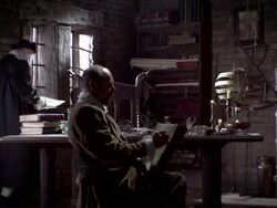 Nostradamus dictates to a scribe while pacing the room. Stock Footage