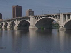 WS Shot of bridge over river / Minneapolis, Minnesota, United States  Stock Footage