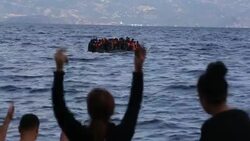Syrian migrants fleeing the war and escaping to Europe, landing on the Greek island of Lesvos on the north coast at Efthalou. Up to 4,000 migrants a day are landing on the island and overwhelming the authorities. They are traficked by illegal Turkish peopl Stock Footage