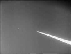 B/W 1947 wide shot smoke coming from Yeager's Bell X-1 airplane as it breaks sound barrier / CA / newsreel Stock Footage