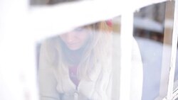 happy woman surfing the net by the window in winter Stock Footage