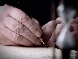 A hand writes with a calligraphy pen. Stock Footage