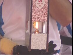 Olympic flame relay gets underway in stadium News Clip