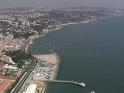AERIAL WS Cityscape with beach / Lisbon, Portugal Stock Footage