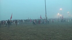 Hindu holy men prepare to plunge into waters during Maha Kumbh News Clip