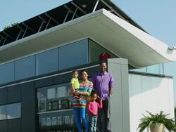 WS Family Portrait in Front of Solar Powered House / Richmond, Virginia, USA Stock Footage
