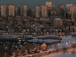 WS View of suburbs with city skyline at dusk in winter / Chicago, Illinois, USA Stock Footage