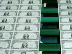 CU, Sheets of American one dollar bills moving fast on conveyor, Washington DC, USA Stock Footage