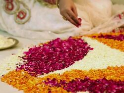 Young woman preparing rangoli in diwali festival Stock Footage