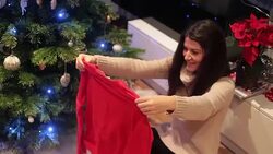 Young women enjoying the gift received for Christmas. Stock Footage