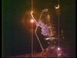 Astronauts on spacewalk to hook up air tanks on ISS. News Clip