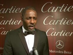 INTERVIEW - Idris Elba on what U2 brought to his film at the 25th Annual Palm Springs International Film Festival Awards Gala Presented By Cartier in Palm Springs, CA on 1/04/14 Stock Footage