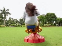 Boy and girl swinging in a Seesaw Stock Footage