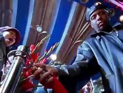 Low angle walking point of view past bodyguard with red rope barrier / up to reporter and cameraman Stock Footage