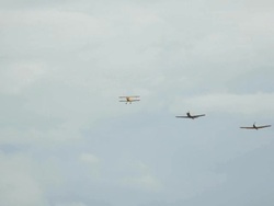 group plane flying across sky Stock Footage