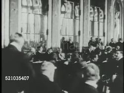 MOT 1919: TREATY OF VERSAILLES: HD: *HA WS Cars arriving at palace (grainy), VS Hall of Mirrors w/ delegates, WS 'The Big Four', Prime Minister David Lloyd George, Premier Vittorio Orlando, Premier Georges Clemenceau & President Woodrow Wilson on porch. Instructional Video