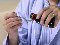 Man taking medicine Stock Footage