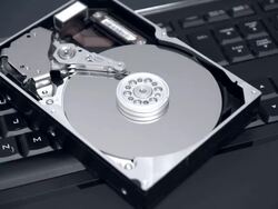 Hard Drive On Top Of Illuminated Keyboard Close Stock Footage