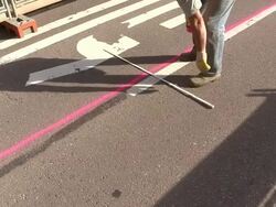 MS Shot of workmen working for measurement on street at sewage pipe / Saarburg, Rhineland Palatinate, Germany Stock Footage