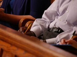 Juror Writing and Taking Notes Stock Footage