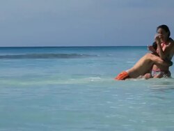 Good Looking Young Couple splashing Stock Footage
