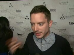 INTERVIEW - Elijah Wood on being a part of the night, if he often plays video games at Assassin's Creed IV Black Flag Launch Party Stock Footage