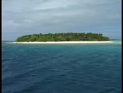 Desert island, from sea, Tonga Stock Footage
