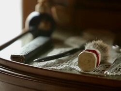 A half-moon dresser with drawers and beauty accessories Stock Footage