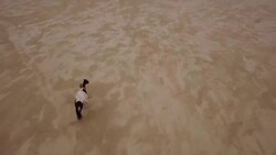 (Drone) Woman Riding Horses in the Desert 02 Stock Footage