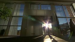 Man entering the Space Weather Prediction Center (NOAA) Stock Footage